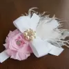 Flower Headband with bow, pearl center and feathers