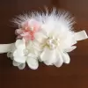 Ivory and Peach Hair Accessory with flowers, feathers and pearls