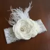 Ivory Headband with pearl center and feathers