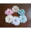 White flower sash with coloured accents