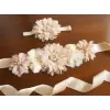 White flower sash with rhinestones and pearls