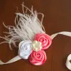 Bracelet with satin flowers, pearl center and feathers