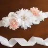 White flower sash with coloured accents