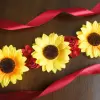 Sunflower sash with red flowers
