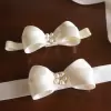 Handmade satin bow sash with pearl center