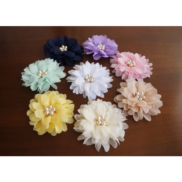 White sash with satin and chiffon flowers