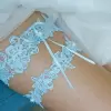 Lace garter wedding set in light blue color with pearls